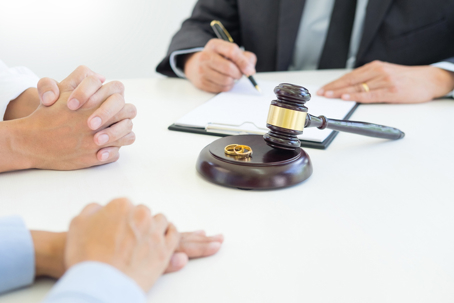 divorcing couple with a lawyer